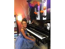 Piano student at performance party