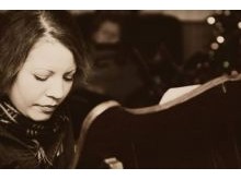 Instructor Suzan Pleva at the piano