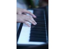 Hands playing keyboard